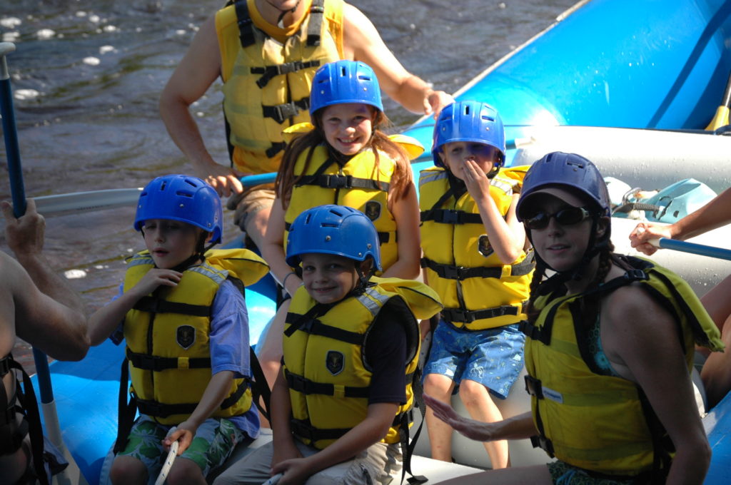 Kids rafting with NEOC