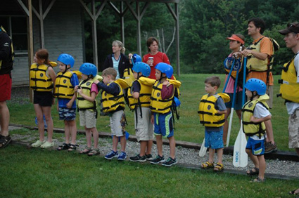 kids lining up for whitewater rafting